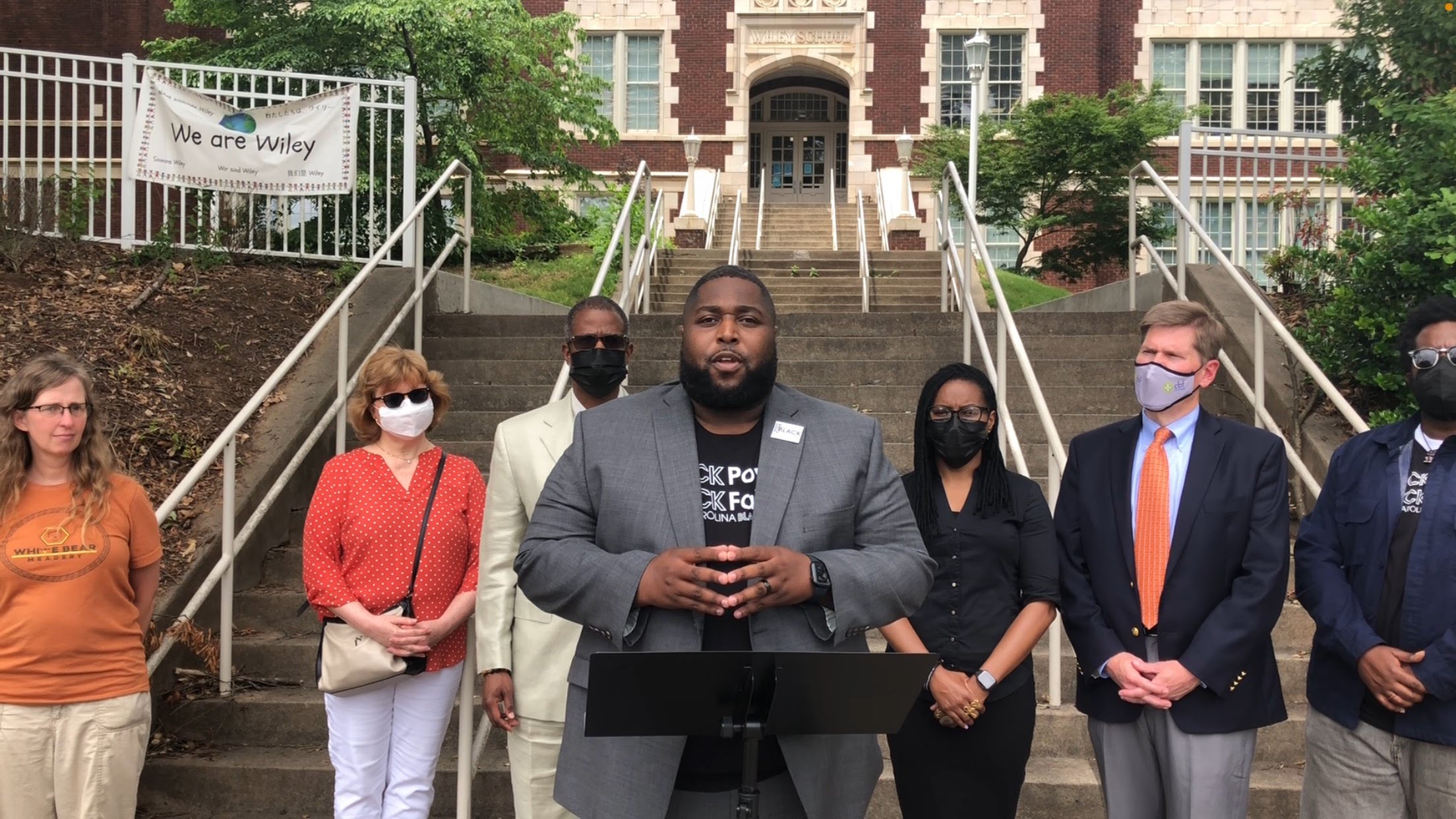Rev. Marcus Fairley speaks during call to action on gun violence convening in Raleigh.